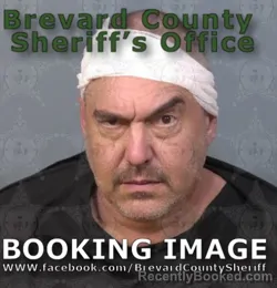 Mugshot of CRIS WOLOSZAK booked in Brevard County, Florida on May 7, 2026