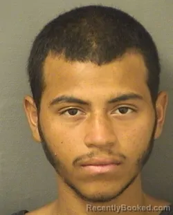 Mugshot of AXEL JOSEPH AMAYAMATUTE