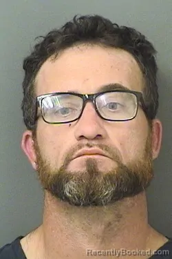 Mugshot of JUSTIN COWLING