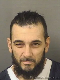 Mugshot of JON BAPTISTE ATHENOSY