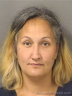 Mugshot of MAILE L KALUAHINE