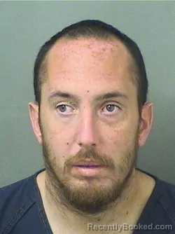 Mugshot of MATTHEW K RISCICA