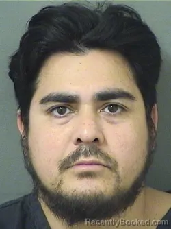 Mugshot of JULIO CESAR J AREVALO booked in Palm Beach County, Florida on March 11, 2026