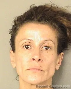 Mugshot of DEBBIE TEIXEIRA CUNHA booked in Palm Beach County, Florida on March 13, 2026