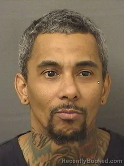 Mugshot of CARLOS ENRIQUE II SIMMONS booked in Palm Beach County, Florida on March 14, 2026