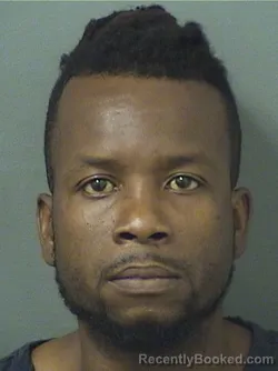 Mugshot of ERNST ORESTE booked in Palm Beach County, Florida on March 14, 2026