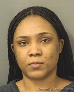 Mugshot of ERKA DECOLLINE booked in Palm Beach County, Florida on March 17, 2026