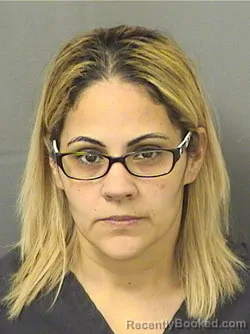 Mugshot of ALICIA IZDELIA HERRERA booked in Palm Beach County, Florida on March 21, 2026