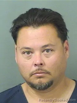 Mugshot of ELLIOTT FRANK GARCIA booked in Palm Beach County, Florida on March 22, 2026