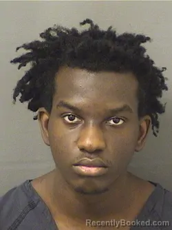 Mugshot of OSIASE SIMON booked in Palm Beach County, Florida on March 24, 2026