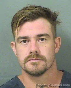 Mugshot of JUSTIN PLEMONS booked in Palm Beach County, Florida on March 27, 2026