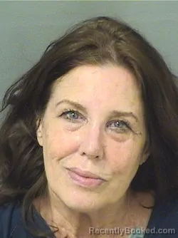 Mugshot of CHRISTINE ANN MOOREHERON booked in Palm Beach County, Florida on March 31, 2026