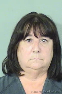 Mugshot of CHRISTINE NADEAU booked in Palm Beach County, Florida on March 31, 2026