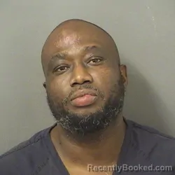 Mugshot of LOVENS OVILMAR booked in Palm Beach County, Florida on March 31, 2026