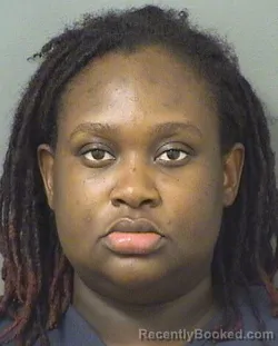 Mugshot of ESTHER ETIENNE booked in Palm Beach County, Florida on April 20, 2026