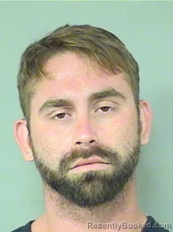 Mugshot of CHARLES WILLIAM RHOADS booked in Palm Beach County, Florida on April 21, 2026