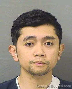 Mugshot of HARVEY CANENCIA BALICOG booked in Palm Beach County, Florida on April 22, 2026