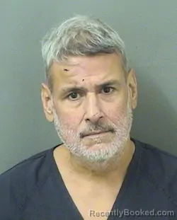 Mugshot of CHARLES NICHOLAS MINUTOLO booked in Palm Beach County, Florida on April 22, 2026