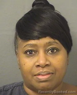 Mugshot of TAWANA TOINETTE HOLLAND booked in Palm Beach County, Florida on April 22, 2026