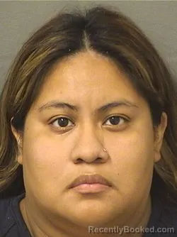 Mugshot of MARTALUZ CISNEROS booked in Palm Beach County, Florida on April 24, 2026