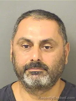 Mugshot of EMRAH TOPCU booked in Palm Beach County, Florida on May 11, 2026