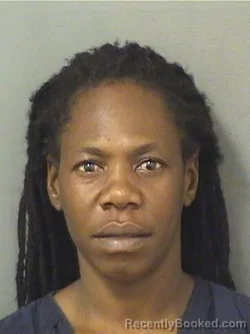 Mugshot of JULIA DORCENT booked in Palm Beach County, Florida on May 19, 2026