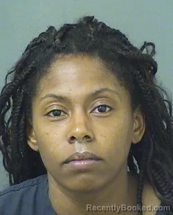 Mugshot of NICOLE MARIA DIXON booked in Palm Beach County, Florida on June 11, 2026