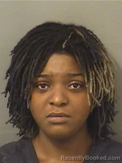 Mugshot of JASMINE KOUSA booked in Palm Beach County, Florida on June 18, 2026