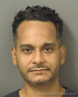Mugshot of CHRISTOPHER JEFFREY REYES booked in Palm Beach County, Florida on June 27, 2026