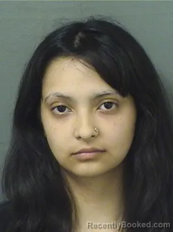Mugshot of Elizabeth Alvarez booked in Palm Beach County, Florida on August 10, 2026
