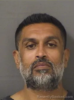 Mugshot of Tapan Rejesh Butala booked in Palm Beach County, Florida on August 29, 2026