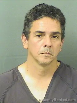 Mugshot of Charles Edwin Oviedo booked in Palm Beach County, Florida on October 12, 2026