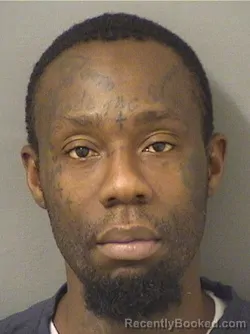 Mugshot of Travis Randolph Glover booked in Palm Beach County, Florida on October 13, 2026