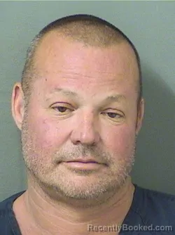 Mugshot of Nathan Ezekiel Burton booked in Palm Beach County, Florida on October 13, 2026