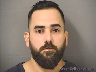 Mugshot of Camilo Lararuiz booked in Palm Beach County, Florida on October 14, 2026