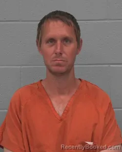 Mugshot of CLARENCE CARL BREWSTER