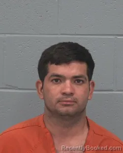 Mugshot of MYNOR ADOLFO MILIAN-MORALES booked in Pasco County, Florida on March 8, 2026