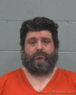 Mugshot of CHARLES MICHAEL NEUMAN booked in Pasco County, Florida on March 8, 2026