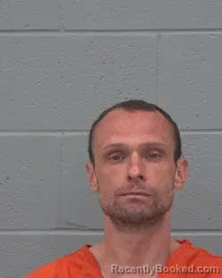 Mugshot of DEVON GILBERT URBIGKEIT