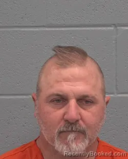 Mugshot of JUSTIN MATTHEW KINNISON booked in Pasco County, Florida on March 11, 2026