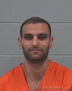 Mugshot of GAMAL MOHAMED A OMAR SAID booked in Pasco County, Florida on March 18, 2026