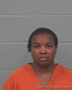 Mugshot of VERONICA EFUA-HATTIE GOZO booked in Pasco County, Florida on March 18, 2026