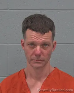 Mugshot of CLINTON BEAU RHODES booked in Pasco County, Florida on March 24, 2026