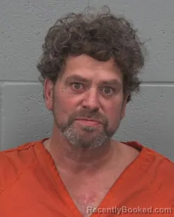 Mugshot of CHRISTOPHER TODD WOODARD booked in Pasco County, Florida on March 25, 2026