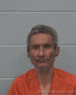 Mugshot of ALBERT RUBEN NAVEDO booked in Pasco County, Florida on March 26, 2026