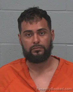 Mugshot of ANGEL MARIO SANTIAGO booked in Pasco County, Florida on March 26, 2026