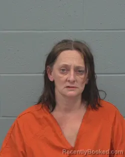 Mugshot of CARINA LEA EXUM booked in Pasco County, Florida on April 14, 2026