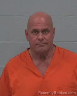 Mugshot of MICHAEL HUGH MUNCE booked in Pasco County, Florida on April 22, 2026