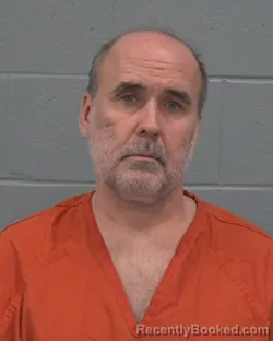 Mugshot of JOHN DERICK GINNIMAN booked in Pasco County, Florida on April 23, 2026