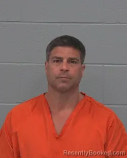 Mugshot of TIMOTHY MICHAEL MOORE booked in Pasco County, Florida on April 24, 2026